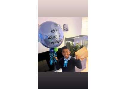 Customer image of Holiday Reveal World Bubble Balloon