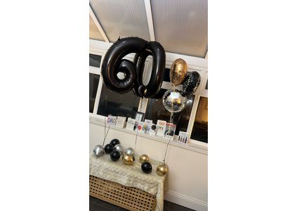 Customer image of 60th Birthday Black Foil Balloon Package